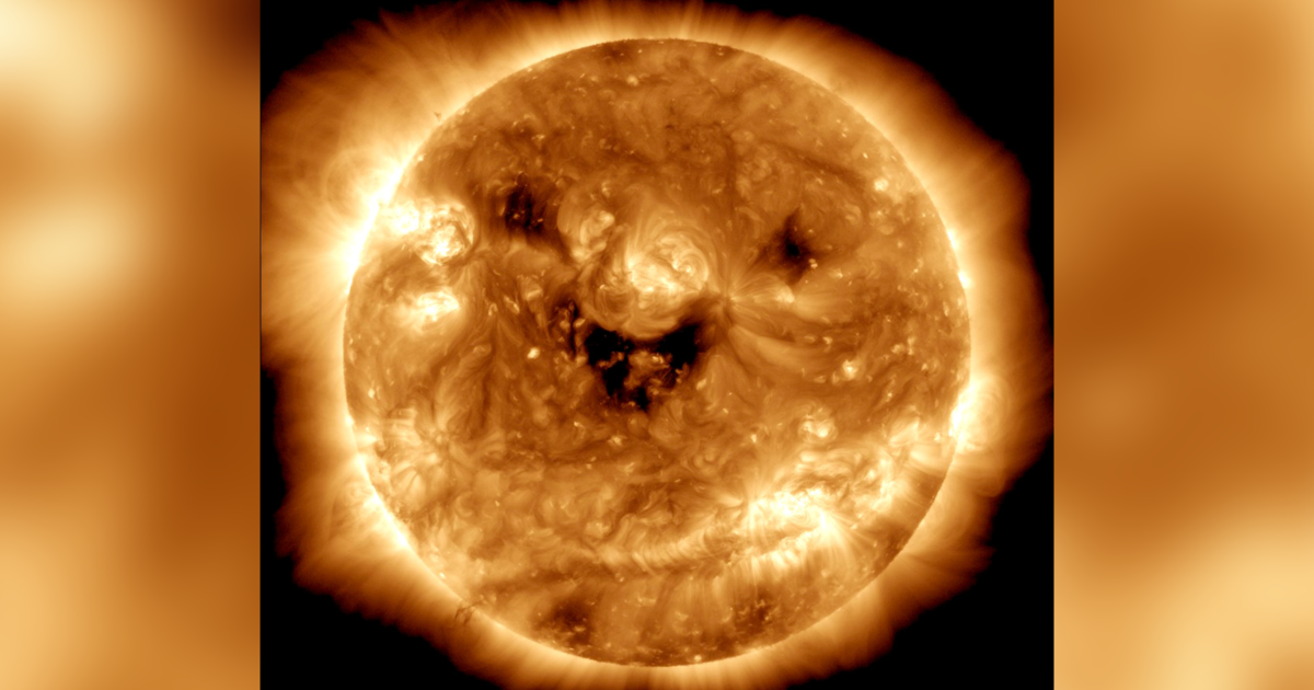 NASA snapped a photo of a giant space pumpkin.  This is the science behind the “smiling” sun.